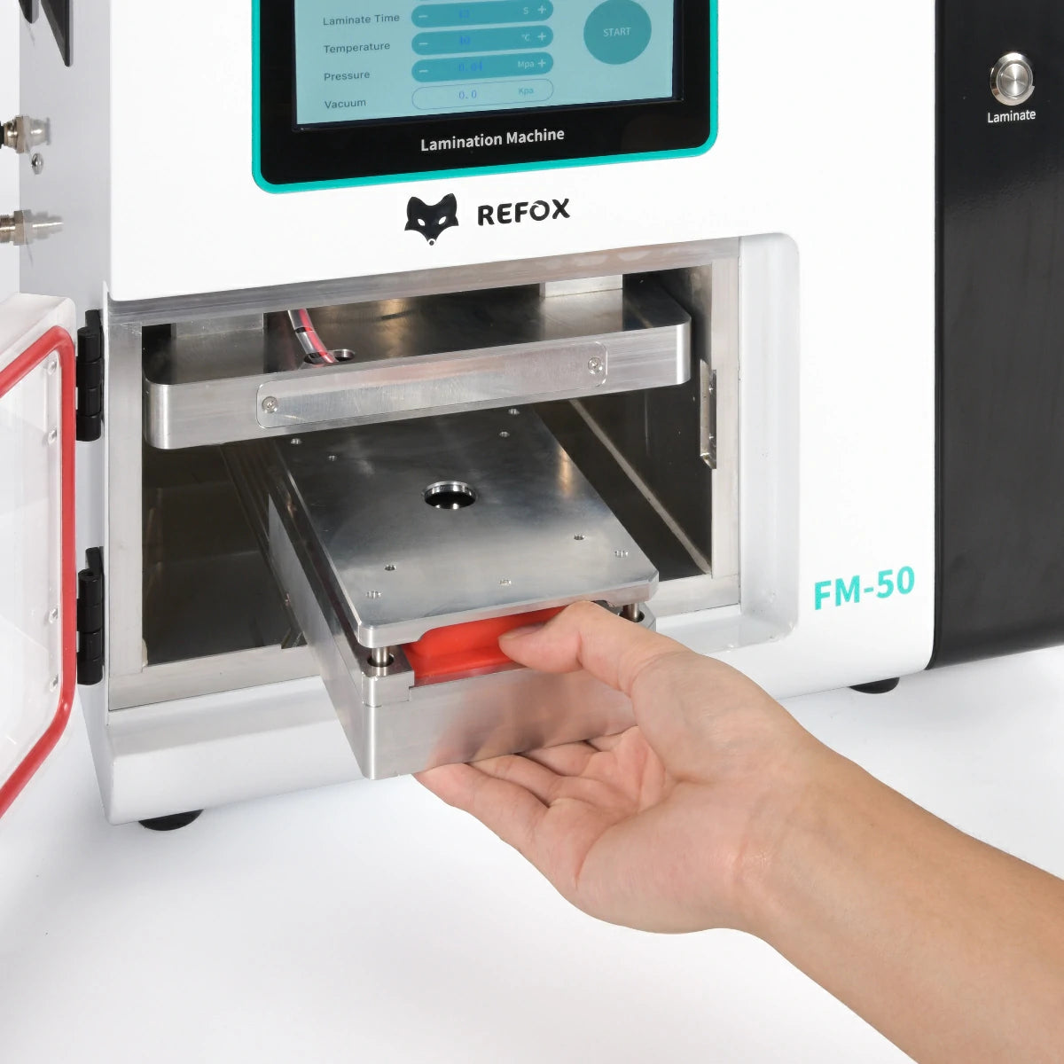 Lamination machine with a hand inserting an item, branded as REFOX, on a white background.