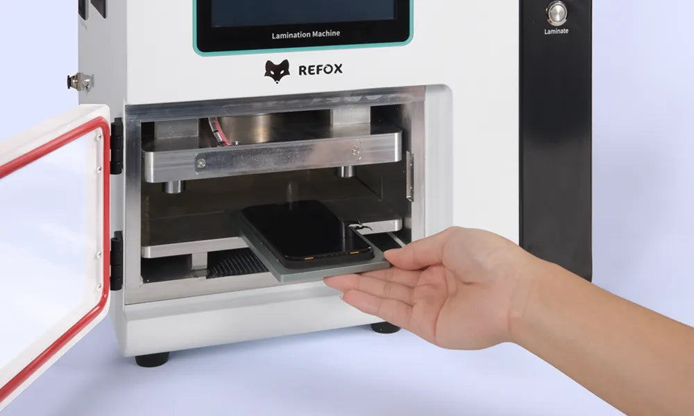 Hand opening a machine labeled 'Lamination Machine' by REFOX on a light blue background
