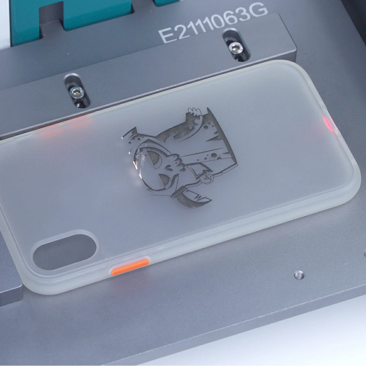 Phone case with engraved design on a gray background