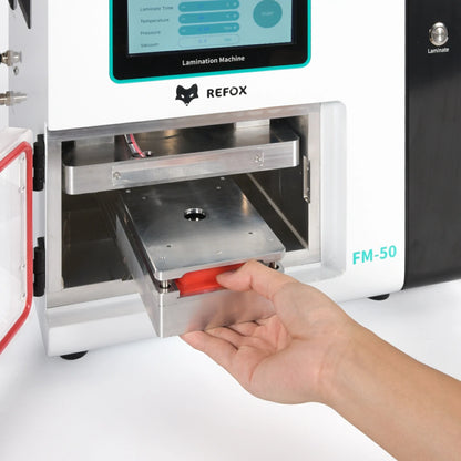 Lamination machine with a hand inserting an item, branded as REFOX, on a white background.