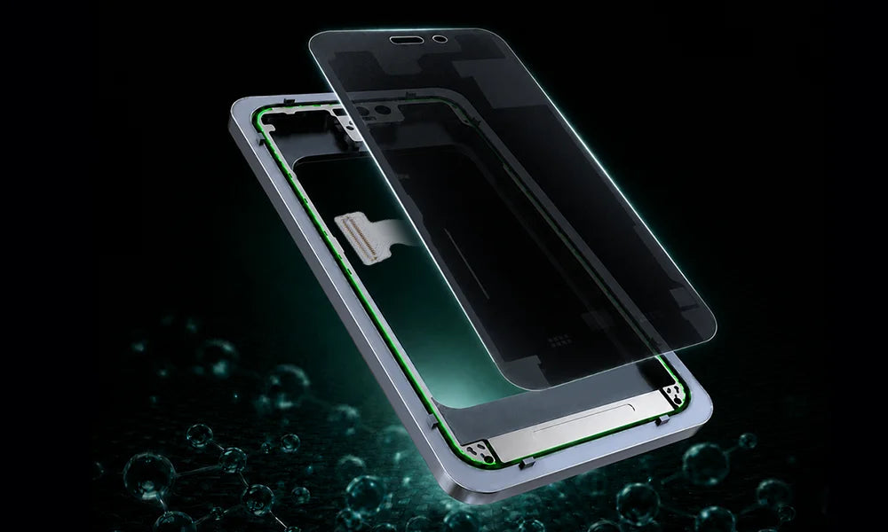 A smartphone screen protector and inner glass panel are shown floating over a phone frame against a black background with glowing green light effects and bubble-like highlights.