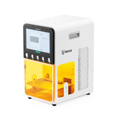 White and yellow appliance with digital display and 'REFOX' branding on a white background