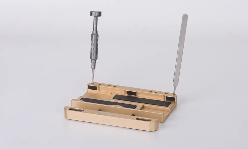 Screwdriver set with multiple slots on a light gray background