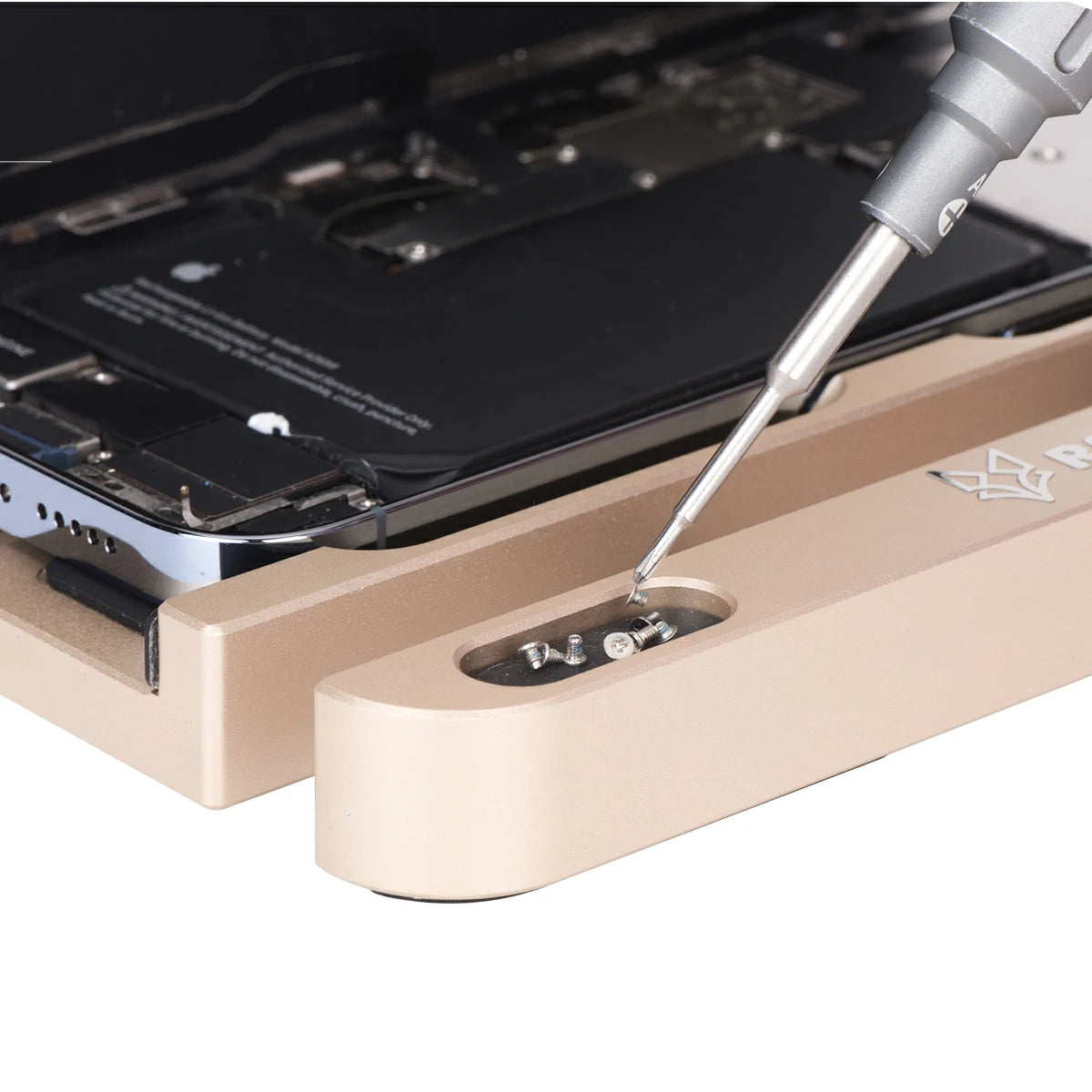 Close-up of a screwdriver inserted into a rs52 phone screen holder with a white background